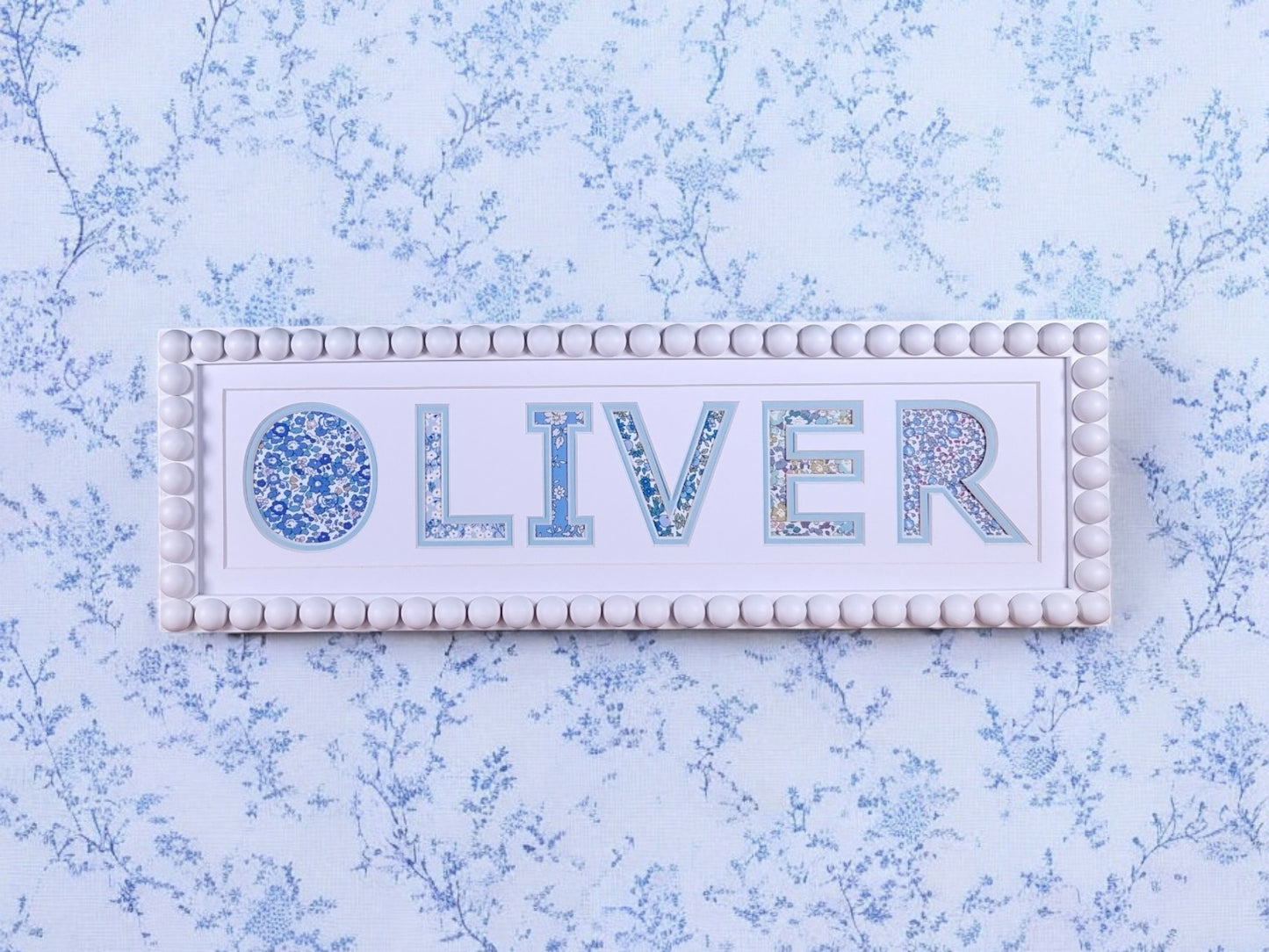 Personalised Bobbin Name Frame with Blue Floral Liberty Fabric