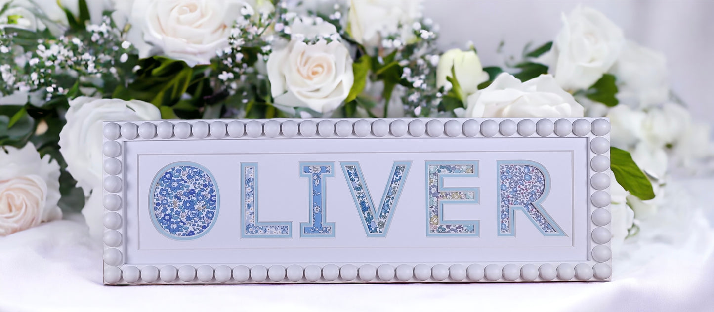 Personalised Bobbin Name Frame with Blue Floral Liberty Fabric