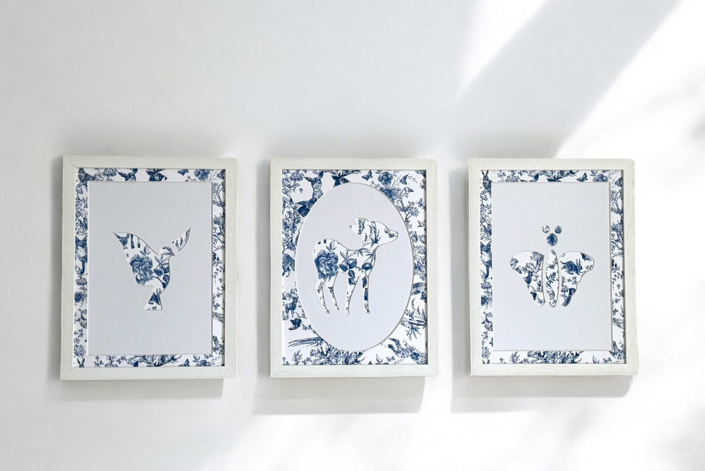 Set of three mounted artwork in forest style